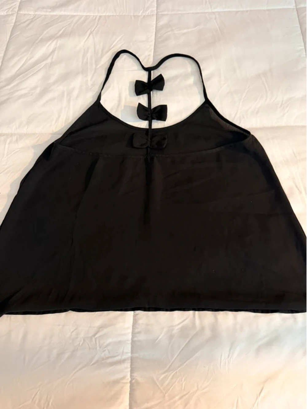 Black bow back crop top with three black bows on the back